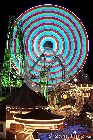 Amusement Rides at night Stock Photo