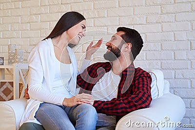 Amusing couple making merry over communicating, close-up shot Stock Photo