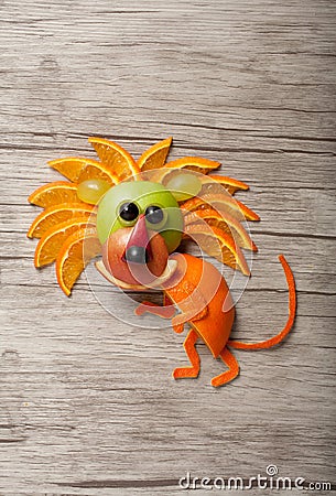 Amusing lion made of fruits Stock Photo