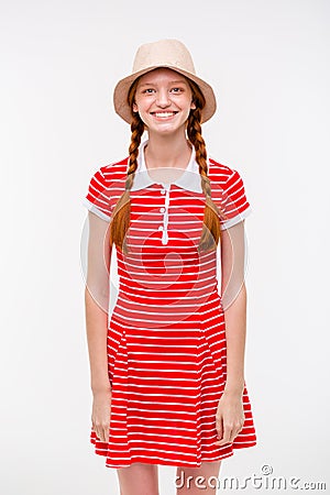 Amusing positive girl with two braids in boonie hat Stock Photo