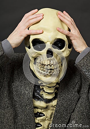 Amusing scared person in mask - skull Stock Photo