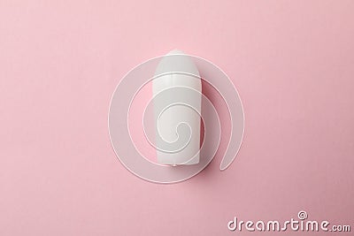 Anal or vaginal candle on pink background Stock Photo