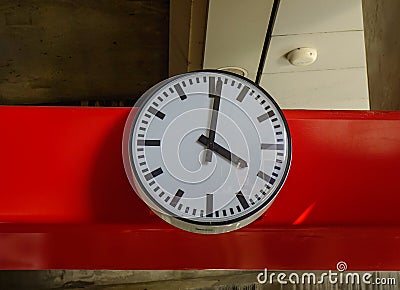 Analog clock at train station Stock Photo