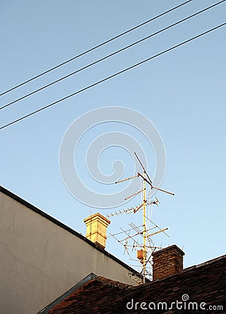 Analog tv antenna on roof Stock Photo