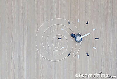 Analog wall clock on the wall Stock Photo