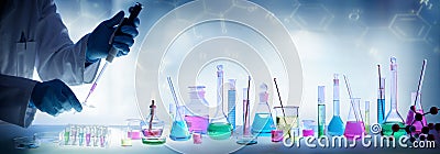 Analysis Laboratory - Scientist With Pipette And Beaker Stock Photo