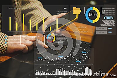 Analyst working on laptop with information database to analyze marketing sale data. Business project or program strategy planning Stock Photo