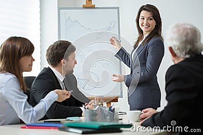 Analyzing company success during business conference Stock Photo