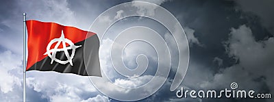 Anarchy flag on a cloudy sky Stock Photo