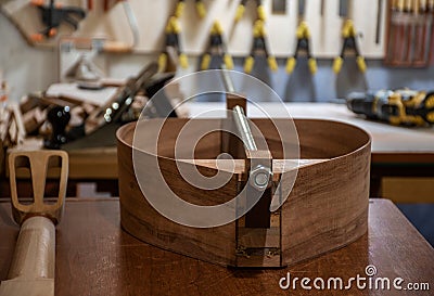 An anatolian / mediterranean lavta musical instrument being build in workshop Stock Photo