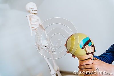 Anatomy class to children of primarÃ­a with a dummy of the human body Stock Photo