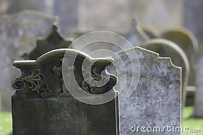 Ancestry. Ghostly graveyard headstones. Stock Photo