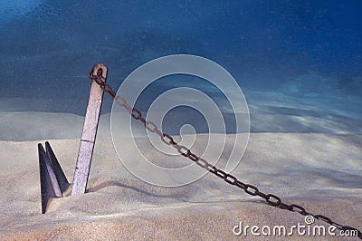 Anchor Buried in Sand Underwater Stock Photo