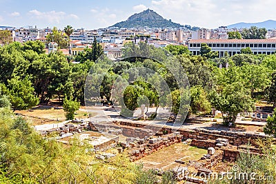 Ancient Agora in Athens, Greece. View of Greek ruins and Mount Lycabettus in distance Editorial Stock Photo