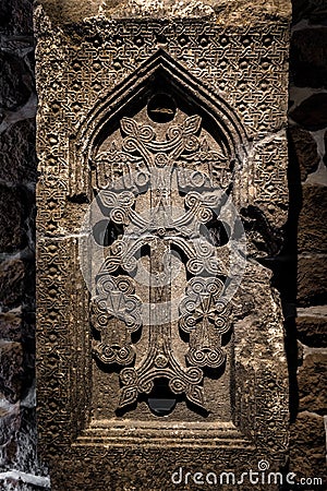 Ancient Armenian tombstone with cross ornament Stock Photo