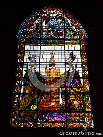 Ancient artistic stained glass window Editorial Stock Photo