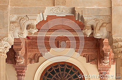 Ancient relief with Elephants heads at column at famous Amber fort near Jaipur, Rajasthan, India Stock Photo