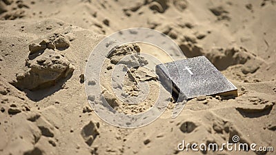 Ancient Bible abandoned in deserted place, concept of faith rejection, atheism Stock Photo