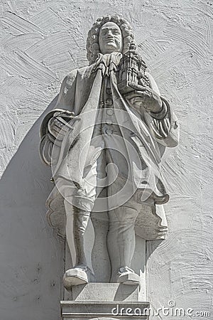 Ancient big statute of scary, fearful and heavy armed gatekeeper, medieval warrior with weapon in historical downtown of Dresden, Editorial Stock Photo