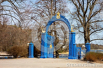 Ancient blue gate as an entrance to Royal Djurgarden Kungliga Djurgarden in Stockholm Stock Photo