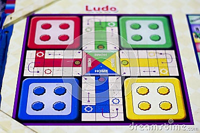 The ancient board game of Ludo Take it Easy is truly international. It has its original name in many countries across the Globe Editorial Stock Photo