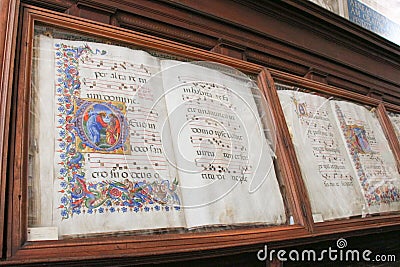 Ancient books in biblioteca Piccolomini of Siena Cathedral. Duomo, Siena, Tuscany, Italy. Editorial Stock Photo