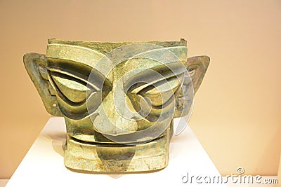 Ancient bronze mask Editorial Stock Photo