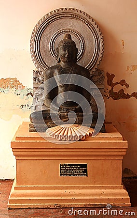 Ancient buddha stone sculpture Editorial Stock Photo