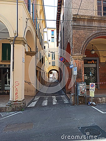 Ancient builgings with their arcades in Bologna city Italy Editorial Stock Photo