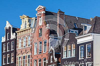 Ancient canal houses in the Dutch capital city Amsterdam Stock Photo