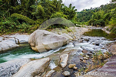 Ancient carved figures on stones in Jayuya Puerto Rico Stock Photo