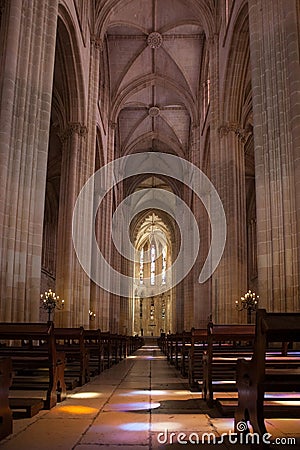 Ancient cathedral with a beautiful interior with columns, glare Editorial Stock Photo