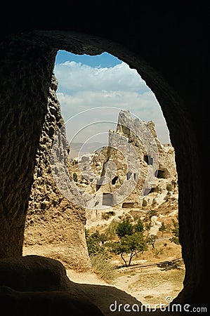 Ancient cavetown near Goreme, Cappadocia, Turkey Stock Photo