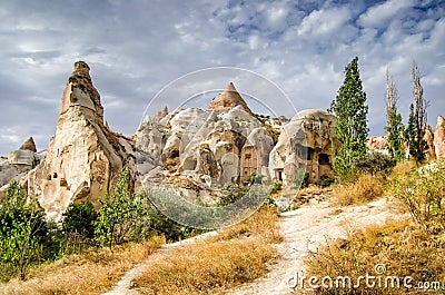 Ancient cavetown near Goreme, Cappadocia, Turkey Stock Photo