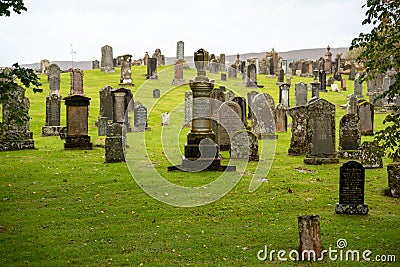 Ancient graveyard in the Highlands of Scotland Editorial Stock Photo