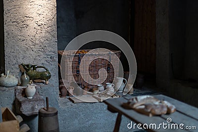 Ancient ceramic and earthenware in the castle on the floor. Editorial Stock Photo