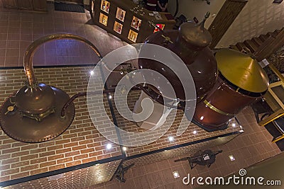 Ancient Charente alembic in the cognac museum. Moscow, Russia. Editorial Stock Photo