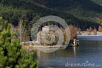 Ancient church Saint Fanourios on the Lake Doxa Greece, region Corinthia, Peloponnese on a autumn, sunny day Stock Photo