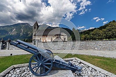 Church of Pinzolo with war cannon - Trentino Italy Stock Photo