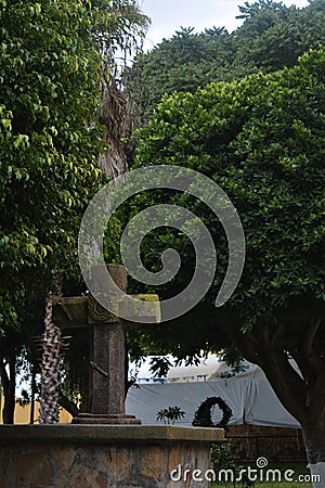 The cross and the tree Stock Photo