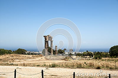 Ancient city in Rhodes Island and a ancient columns in the area. Stock Photo