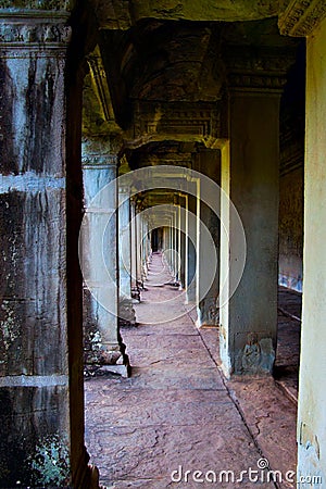 Ancient colonnade in Angkor Wat Stock Photo