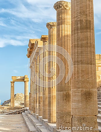 Ancient columns on the Lindos island, Greece. Vertical shot Stock Photo