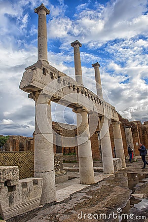 Ancient columns ruins after the eruption of Vesuvius in Pompeii, Italy Editorial Stock Photo