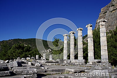 Ancient columns at the temple of Athena in Priene, Turkey. Editorial Stock Photo
