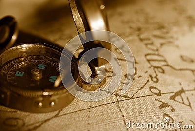 Ancient compass and map background Stock Photo