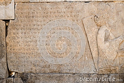 Ancient Cuneiform inscription at the Persepolis. Editorial Stock Photo