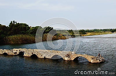 The ancient destroyed bridge in Fertilia Stock Photo
