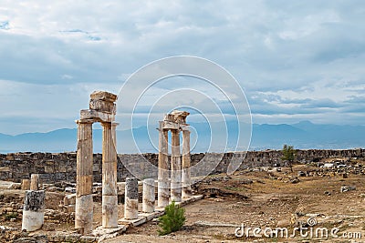 The ancient destroyed city of Hierapolis near Pamukkale, Denizli, Turkey in the summer. On a background the sky in overcast. Horiz Stock Photo
