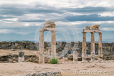 The ancient destroyed city of Hierapolis near Pamukkale, Denizli, Turkey in the summer. On a background the sky in overcast. Horiz Stock Photo